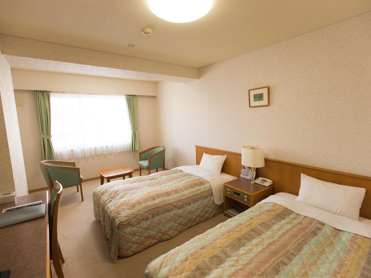Hotel Laurel Shinhidaka Habitación foto