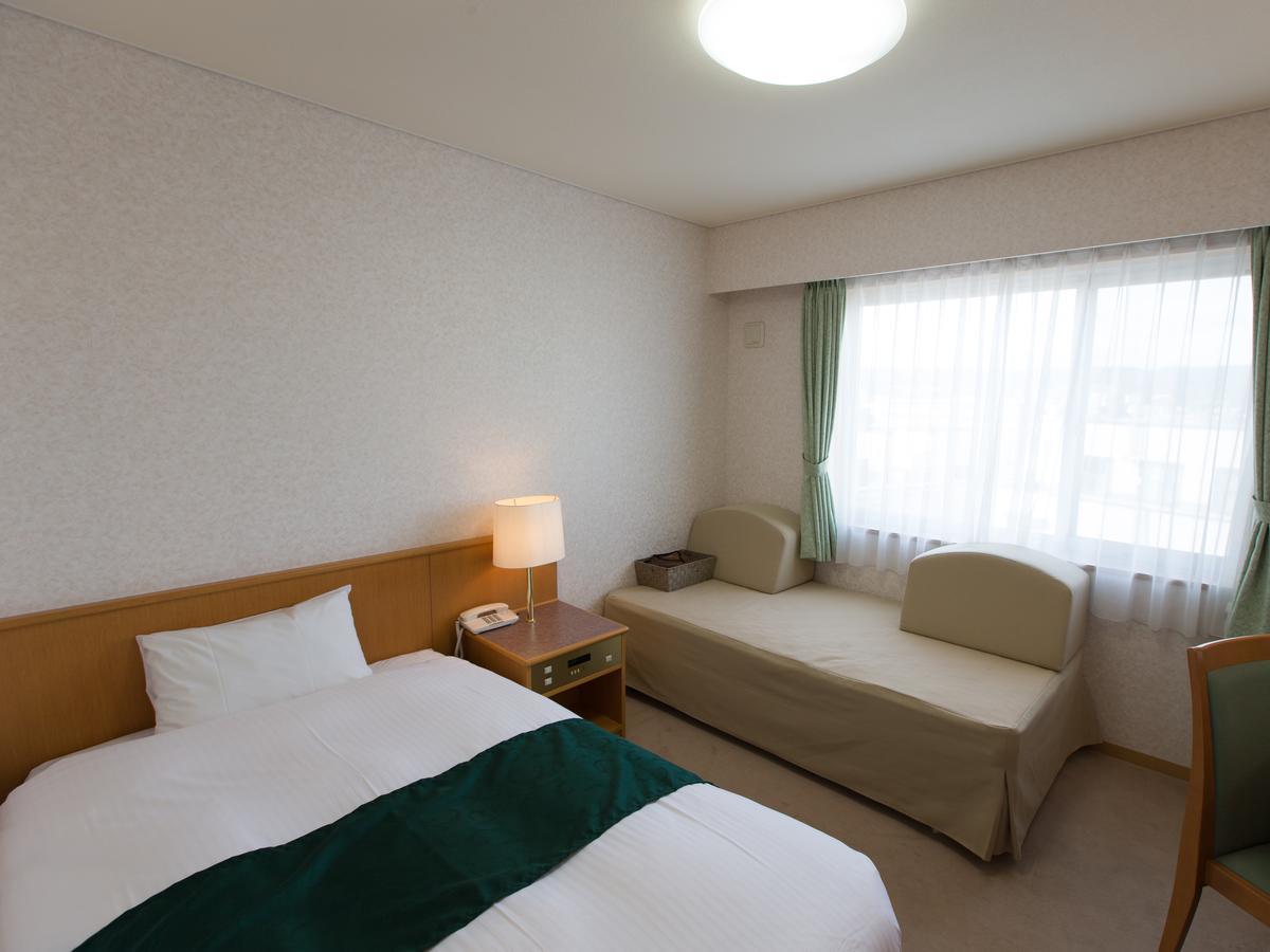 Hotel Laurel Shinhidaka Habitación foto
