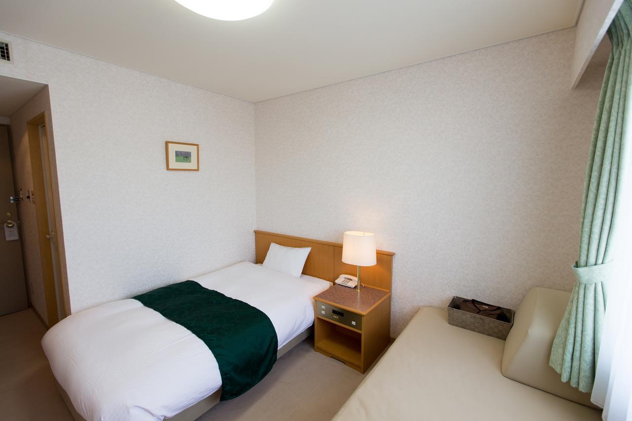 Hotel Laurel Shinhidaka Habitación foto